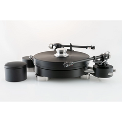 TRANSROTOR MAX NERO | VINYL SOUND Max comes in a POM chassis, 7kg POM platter and the option to equip up to two 9-inch or 12-inch tonearm base. The arm board can be ordered to accommodate your choice of tonearm mounting specification. Standard package includes the Konstant Eins NERO power supply, record weight (aluminum 370 gram) and an optional tone arm.