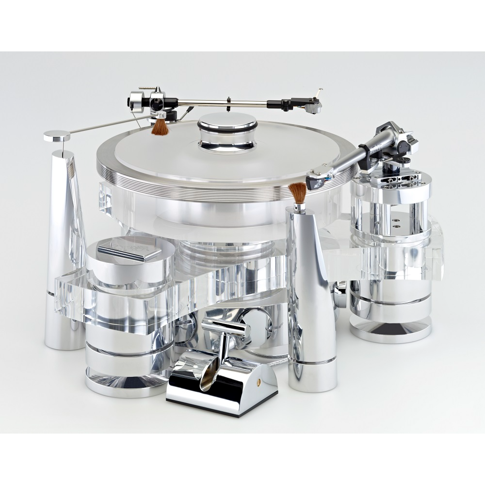 TRANSROTOR TOURBILLION FMD TURNTABLE | VINYL SOUND Tourbillon FMD is second from the top-of-the-line Transrotor turntable. It features a combination of Polished Aluminum Clear Acrylic chassis, an 80mm Acrylic platter, Rotor Ring, FMD (Free Magnetic Drive) bearing and the option to equip up to two 9 or 12-inch tone arm board.