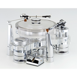 TRANSROTOR TOURBILLION FMD TURNTABLE | VINYL SOUND Tourbillon FMD is second from the top-of-the-line Transrotor turntable. It features a combination of Polished Aluminum Clear Acrylic chassis, an 80mm Acrylic platter, Rotor Ring, FMD (Free Magnetic Drive) bearing and the option to equip up to two 9 or 12-inch tone arm board.