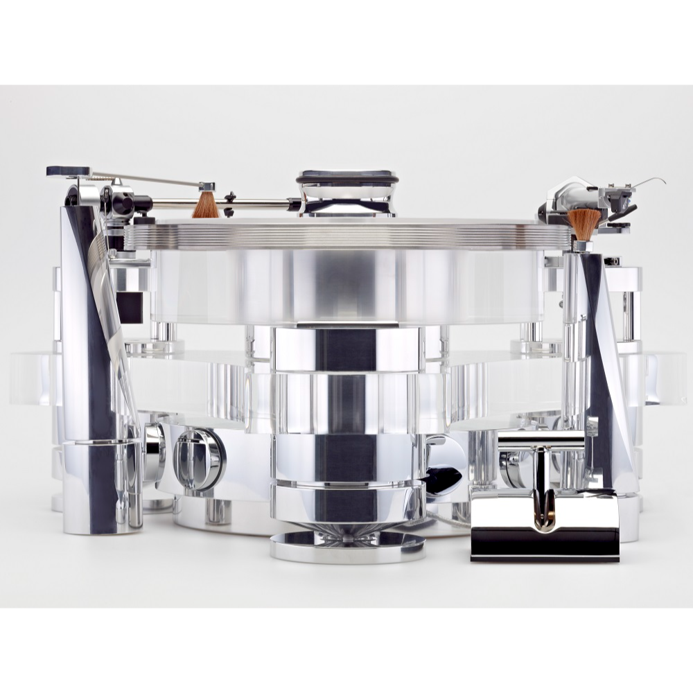 TRANSROTOR TOURBILLION FMD TURNTABLE | VINYL SOUND Tourbillon FMD is second from the top-of-the-line Transrotor turntable. It features a combination of Polished Aluminum Clear Acrylic chassis, an 80mm Acrylic platter, Rotor Ring, FMD (Free Magnetic Drive) bearing and the option to equip up to two 9 or 12-inch tone arm board.